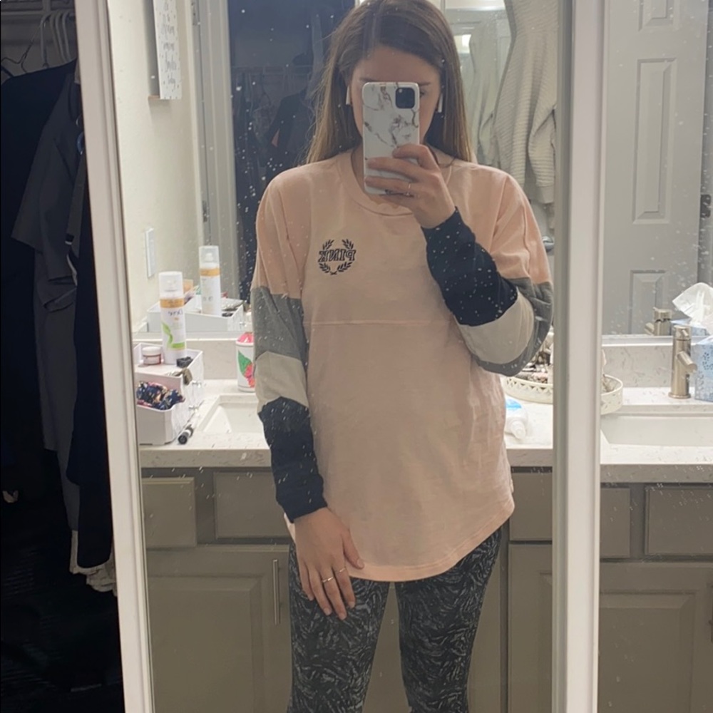 Pink crew neck long sleeved top